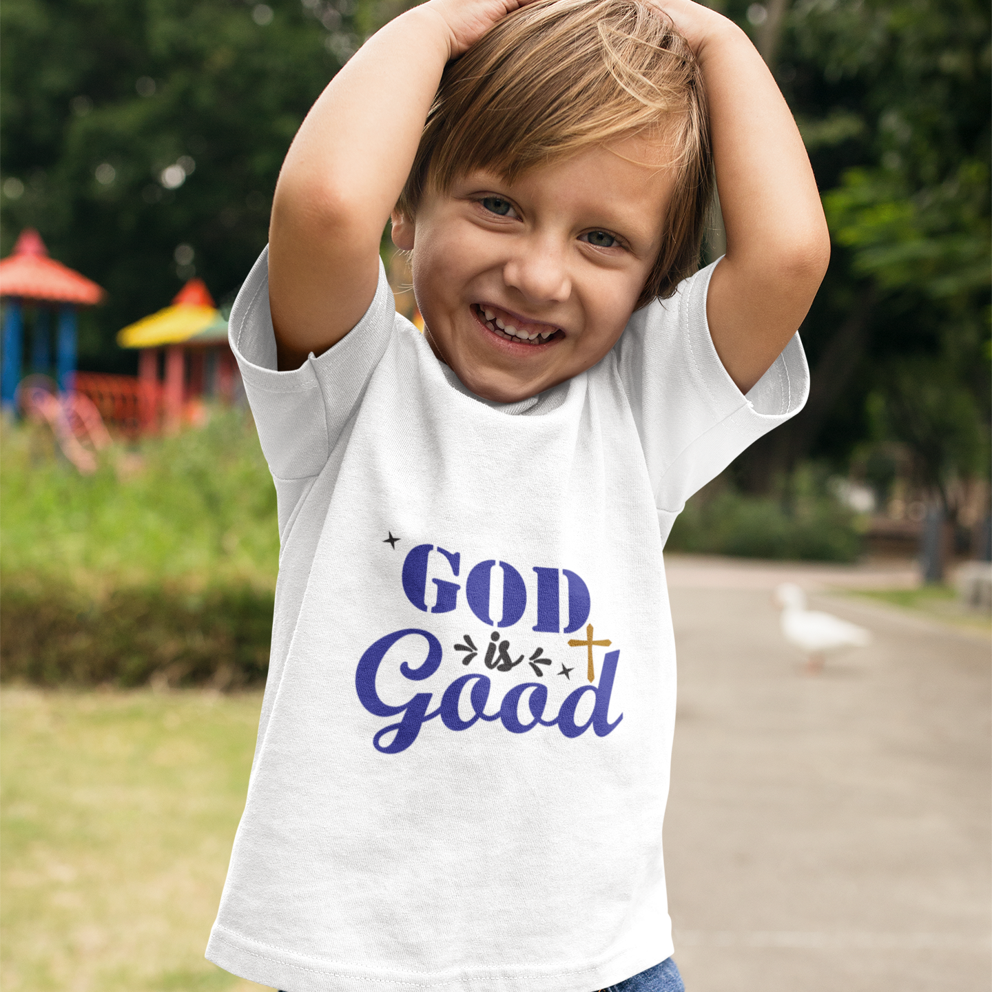boy-wearing-a-t-shirt-mockup-while-at-a-park-with-ducks-a17942.png